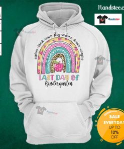 Happy kindergarten teacher and student in colorful hoodies celebrating the last day of school with a rainbow theme.