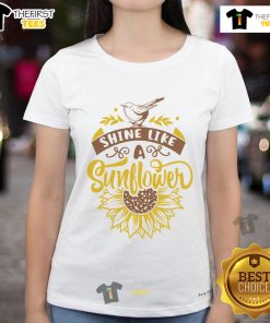 Happy Shine Like A Sunflower Ladies Tee featuring a vibrant sunflower graphic on a stylish women's shirt.