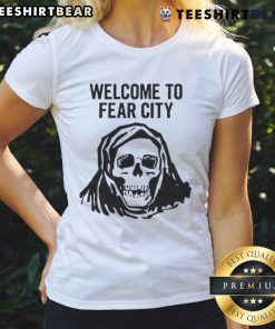 Happy skull graphic on a ladies tee, welcoming you to Fear City with a fun and edgy design for Halloween enthusiasts.