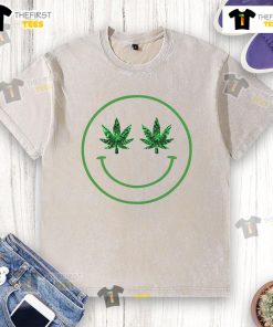 Happy smile cannabis washed t-shirt featuring a vibrant green design, perfect for casual and eco-friendly fashion enthusiasts.