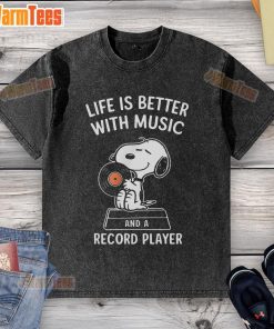Happy Snoopy on a washed t-shirt with 'Life is better with music and a record player' design, perfect for music lovers.