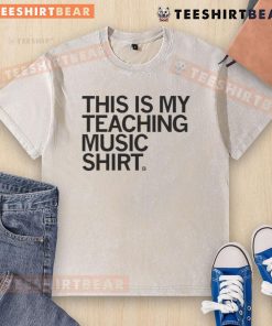 Alt Text: Happy teacher wearing a 'This Is My Teaching Music' washed t-shirt, showcasing passion for music education.