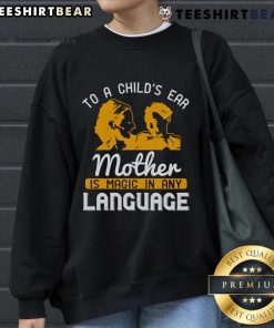 Happy child wearing 'Mother Is Magic In Any Language' sweatshirt, showcasing love and warmth in a joyful moment.