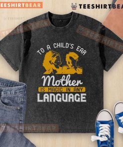 Happy child listening to mother, wearing 'Magic in Any Language' washed t-shirt, showcasing love and connection.