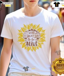 Happy sunflower T-shirt design with the phrase 'What A Great Day To Be Alive' in vibrant colors, perfect for sunny days.