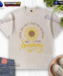 Happy sunflower washed t-shirt with 'Be the sunshine' quote, perfect for brightening your day and wardrobe.