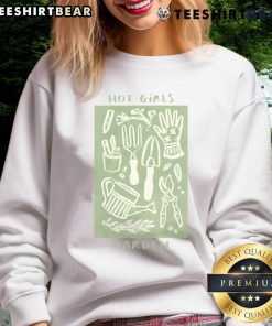 Hot girls in cottagecore sweatshirts gardening among colorful plants, celebrating plant lover culture in a vibrant garden.