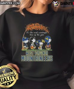 Alt Text: Hot Snoopy The Peanuts x Michigan Wolverines sweatshirt for the holidays, perfect for festive fans.