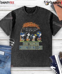 Hot Snoopy Peanuts X Michigan Wolverines t-shirt celebrating the holiday season with festive design and vibrant colors.