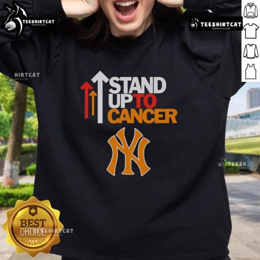 Hot Stand Up To Cancer New York Yankees sweatshirt featuring bold logo and vibrant colors, perfect for fans.