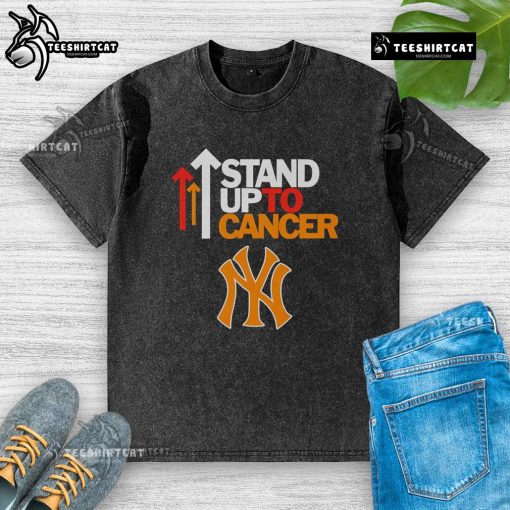 Alt Text: Hot Stand Up To Cancer New York Yankees washed t-shirt featuring bold graphics and soft fabric for a casual look.
