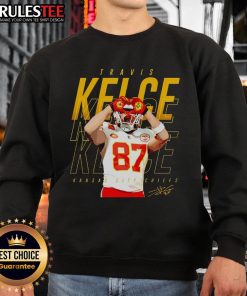 Travis Kelce Kansas City Chiefs Heart Sweatshirt in red, perfect for fans showcasing team pride and style.