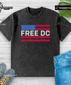 Alt Text: Stylish Hot Washington Free DC washed t-shirt displayed on a wooden surface, perfect for casual wear and local pride.
