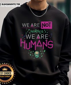 Casual Hot We Are Humans sweatshirt displayed on a hanger, featuring a bold graphic design in a cozy fabric.