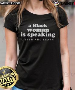 Empowered Black woman speaking on stage, promoting the 'Listen and Learn Ladies' tee for inspiration and empowerment.