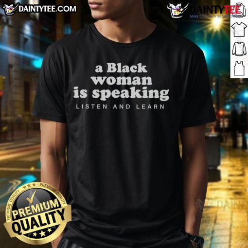Black woman wearing 'Listen and Learn' T-shirt, promoting empowerment and education in a vibrant setting.