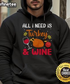 Cozy Thanksgiving hoodie featuring 'All I Need Is Turkey And Wine' design, perfect for holiday celebrations.