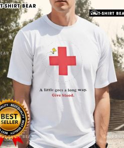 Alt Text: American Red Cross Woodstock 'A Little Goes A Long Way' Give Blood T-Shirt showcasing support for blood donation.