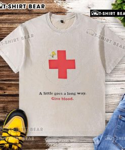 Nice American Red Cross Woodstock t-shirt promoting blood donation with 'A Little Goes A Long Way' message.