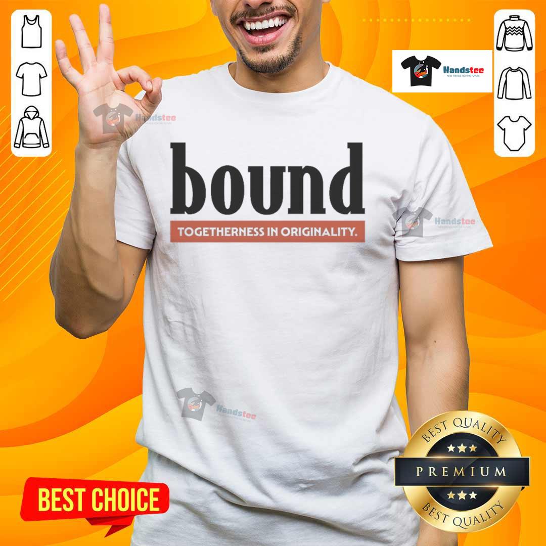 Nice Bound Red Label T Shirt Stylish nice bound red label t-shirt displayed on a wooden surface, showcasing its vibrant color and modern design.