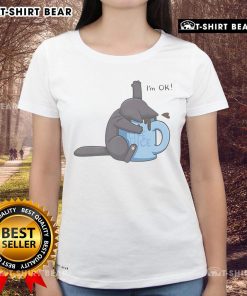 Cute cat playfully drowning in a coffee cup, featured on a humorous I'm Ok ladies tee design. Perfect for cat lovers!