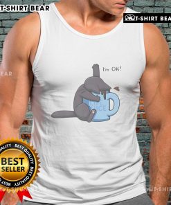 Cute cat playfully submerged in a coffee cup, wearing an 'I'm OK' tank top, perfect for coffee lovers and cat enthusiasts.