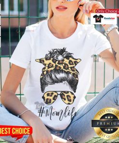 Classy mom wearing leopard pattern shades and a cool messy bun in a stylish ladies tee, embodying chic mom life.