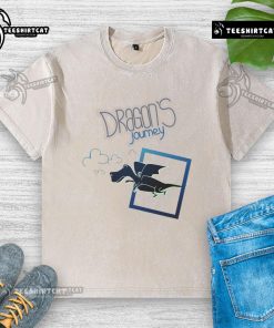 Alt Text: Cartoon fantasy dragon flying on a washed t-shirt, showcasing a vibrant design from Nice Dragon's Journey.