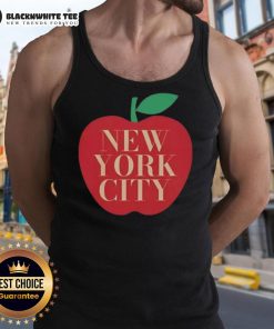 Eric Stonestreet wearing a stylish tank top in New York City, showcasing his casual summer fashion.