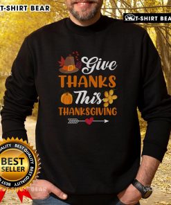 Cozy pumpkin harvest sweatshirt with 'Give Thanks' design, perfect for Thanksgiving celebrations and fall fashion.