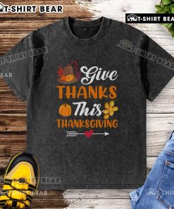 Alt Text: Cozy washed t-shirt featuring 'Give Thanks' design, perfect for Thanksgiving and celebrating the pumpkin harvest.