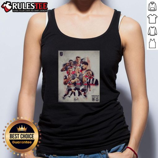 Grimsby Town soccer player wearing a stylish tank top, showcasing team spirit and athleticism on the field.