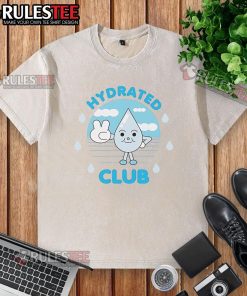 Nice Hydrated Club washed t-shirt displayed on a wooden background, showcasing its soft texture and stylish design.