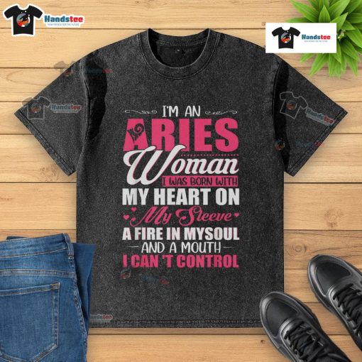 Aries woman wearing a stylish washed t-shirt with a heart on the sleeve, showcasing her fiery personality and bold expression.