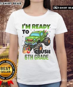 Girl wearing 'I'm Ready to Crush 6th Grade' monster truck tee, showcasing a fun and bold design for kids' apparel.