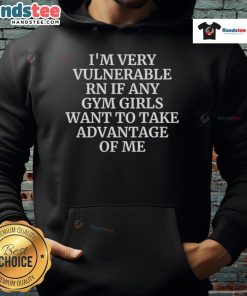 Fit person in a 'Nice, I'm Very Vulnerable Right Now' hoodie at the gym, inviting gym girls to connect.