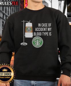 Funny sweatshirt reading 'In Case of Accident, My Blood Type is Starbucks Coffee' - perfect for coffee lovers.