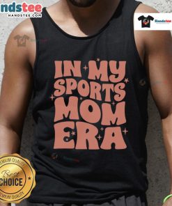 Woman wearing 'Nice in My Sports Mom Era' tank top, showcasing sporty style and confidence outdoors.