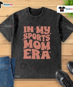 Alt Text: Woman wearing a 'Nice In My Sports Mom Era' washed t-shirt, showcasing casual style and sporty vibe.