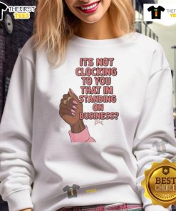 Model wearing 'Nice It's Not Clocking To You That I'm Standing On Business Hoesmad' sweatshirt in urban setting.