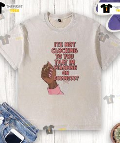 Model wearing a hand-washed 'Business Hoesmad' t-shirt, showcasing unique style and confidence in urban setting.