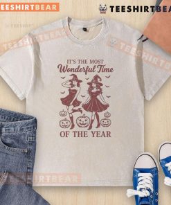Alt Text: Halloween witch graphic on a washed t-shirt, perfect for celebrating the most wonderful time of the year.