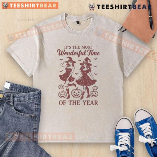 Alt Text: Halloween witch graphic on a washed t-shirt, perfect for celebrating the most wonderful time of the year.