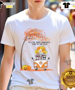 Nice Jack and Sally Halloween pumpkin design on a t-shirt with autumn trees, perfect for festive fall celebrations.