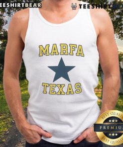 Jensen Ackles in Marfa, Texas, wearing a stylish tank top, showcasing his casual summer look.