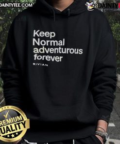Man wearing a Nice Keep Normal Adventurous Forever Rivian hoodie outdoors, showcasing style and adventure spirit.
