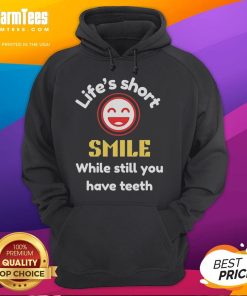 Cozy hoodie featuring 'Life's Short, Smile While You Still Have Teeth' graphic, perfect for casual wear and uplifting vibes.