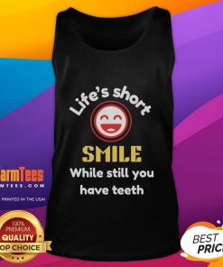 Stylish tank top with 'Life's Short, Smile While You Still Have Teeth' graphic, perfect for casual summer wear.