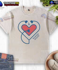 Heart graphic on a washed t-shirt for Nurses Night, featuring Los Angeles Dodgers logo, perfect for fans and healthcare workers.