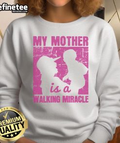 Alt Text: Nice My Mother Is A Walking Miracle Sweatshirt in soft fabric, featuring a heartfelt message for moms.